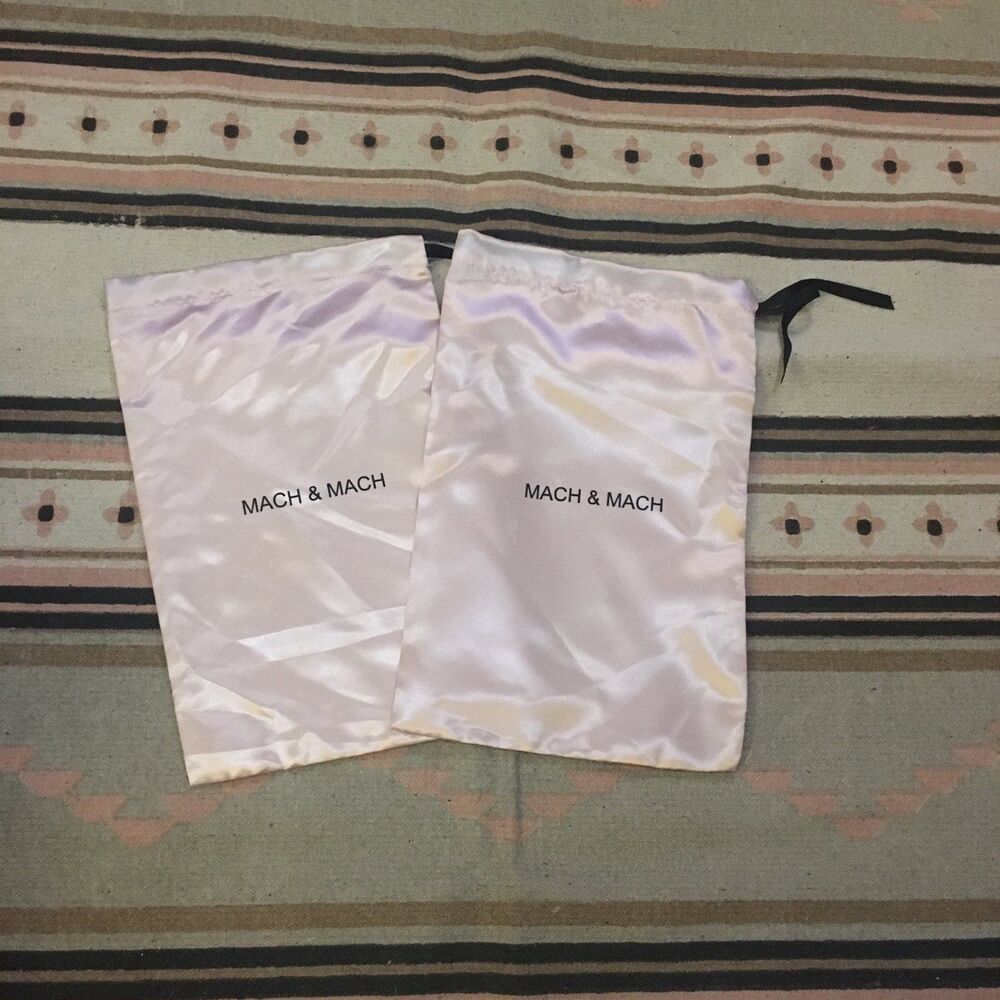 Two (2) Mach & Mach dustbags garment
Pink Satin light soft drawstring 14” x 9”